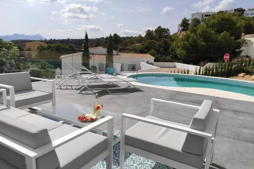 Precioso apartamento en una villa con piscina en Cumbre del Sol Moraira Benitachell Exterior foto
